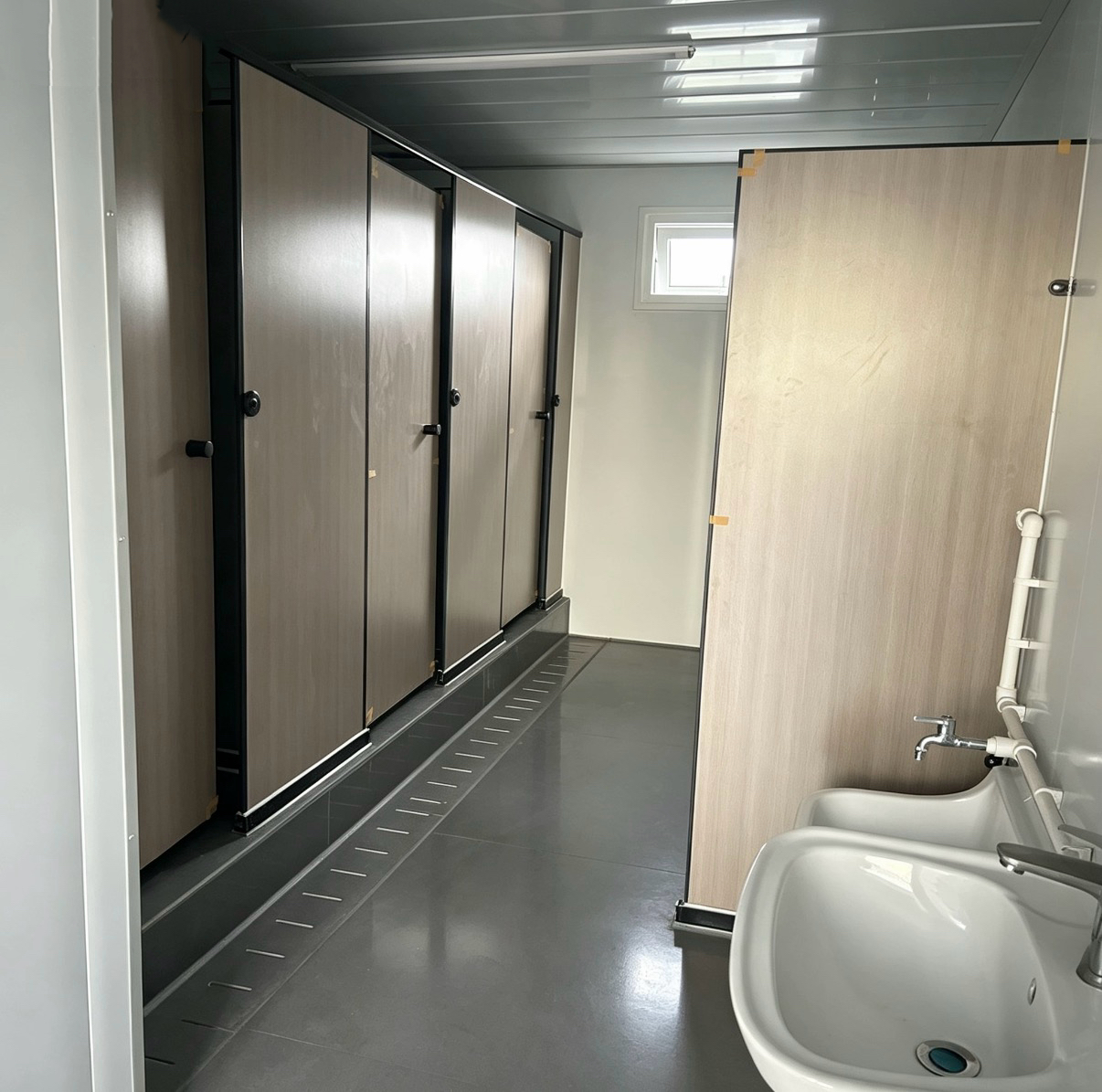 Flat‑pack container house